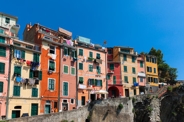 Fototapeta na wymiar Old Town with colorful houses, Riomaggiore, Cinque Terre, Liguria, Italy, July 2013
