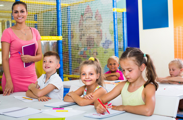 cheerful kids at school lesson .