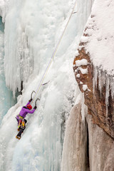 Ice Climber Ascending Waterfall Ice