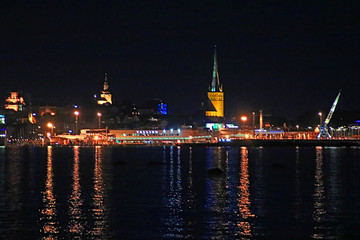 View of the old town of Tallinn and Saint Olaf church at the night, Estonia
