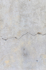crack concrete floor or wall, gray grunge cement surface with cracks are long crooked line, abstract texture background, close up top view with copy space - Image