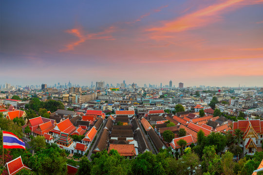 Panorama view of Bangkok from Golden Mountain on sunset cloudy sky
