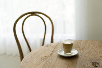 cup of coffee on wooden table, cafe latte milk coffee