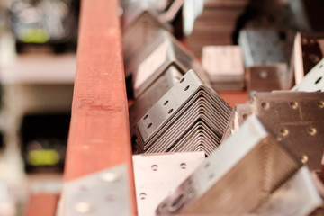 score. metal mount for timber. lying on the shelf. shallow depth of cut.