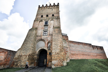 Obraz premium View on Lutsk High Castle, also known as Lubart Castle towering over the Styr River, Ukraine.