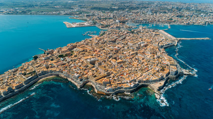 Aerial panoramic view of Ortigia island,old town of Syracuse.Small island on Sicily,Italy.Sicilian...