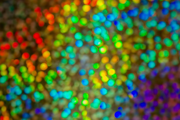 Fototapeta na wymiar Bokeh, colorful abstract background. Glare of many lights out of focus.