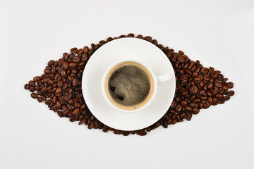 Cup of coffee and coffee beans.