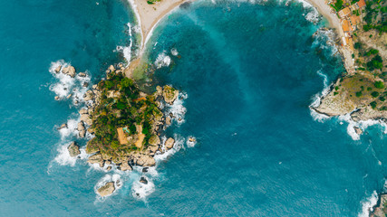 Aerial view of charming coastal Mediterranean small town on Sicily island, Taormina. Beaches of...