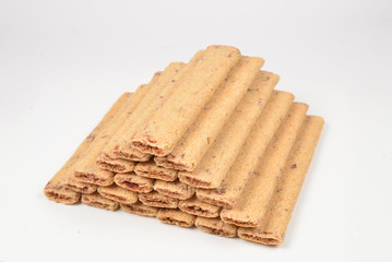 Waffle bar with jam isolated on white. Pyramid of waffers.