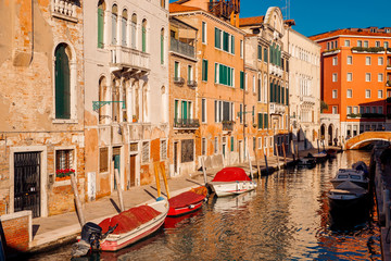 Fototapeta na wymiar Parked boats, gondolas transport movement Grand Canal Venice, Italy.
