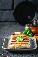 Grilled kebabs on dark background. Selective focus, space for text.