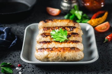Grilled kebabs on dark background. Selective focus, space for text.