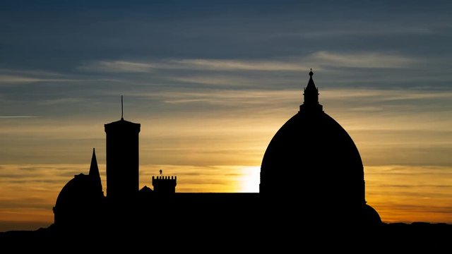 Florence: Cathedral of Saint Mary of the Flowers in silhouette at sunset, Tuscany, Italy