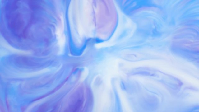 Colored paint beautiful spread in liquid, realtime shot