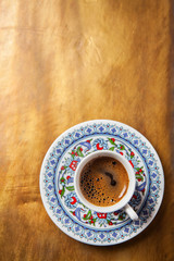 Black coffee in traditional Turkish cup