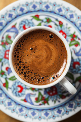 Black coffee in traditional Turkish cup