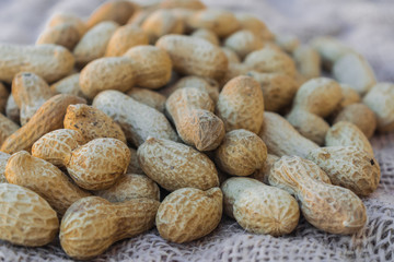 Peanuts on sack surface
