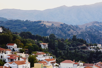 View from above of a small, traditional, Greek village in mountains