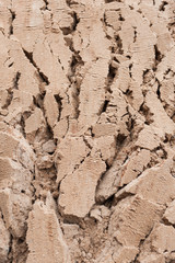 background deep cracks in wet sand