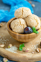 Homemade Moroccan sesame cookies in a wooden bowl.