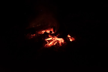 close up detail of camp fire , bonfire burning in dark