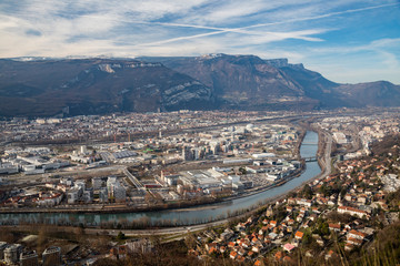 Grenoble, France, January 2019 : North west part of the city with the Vercors mountains and the Isere river. - obrazy, fototapety, plakaty