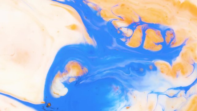 Colored paint beautiful spread in liquid, realtime shot