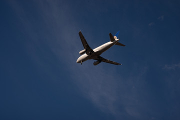 Airplane flying on a Sunny Day