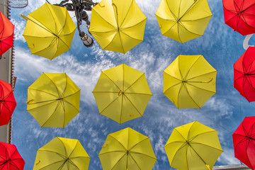 Fototapeta na wymiar Christmas time in Torrox Spain with colorful umbrellas - feliz navidad