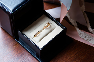 Wedding rings in a black and white jewelry box