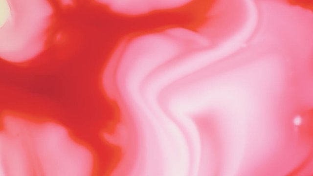 Colored paint beautiful spread in liquid, realtime shot