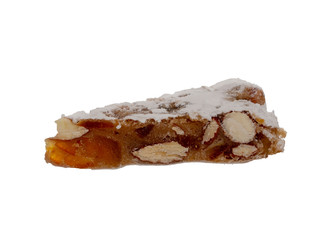 Panforte slice, isolated on white, Italian Christmas sweet dessert, cake make with dried fruits and nuts.