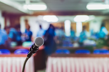 Blurred and Soft focus of head microphone on stage of Education conference or event whit blurred...