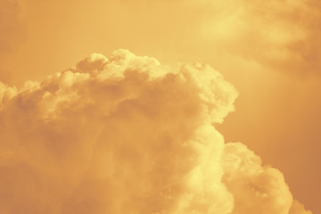Orange fluffy clouds as background (abstract)