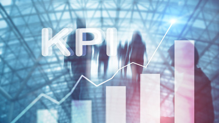 KPI - Key Performance Indicator. Business and technology concept. Multiple exposure, mixed media. Financial concept on blurred background.
