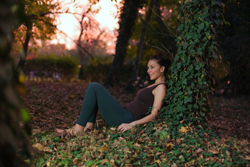 young woman relaxing in the forest