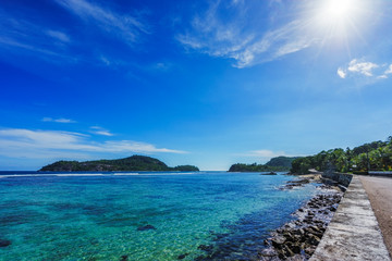 Road on seychelles ocean coast