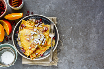 Sweet crepes with pomegranate
