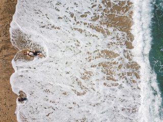 Aerial View From Flying Drone Of People Relaxing