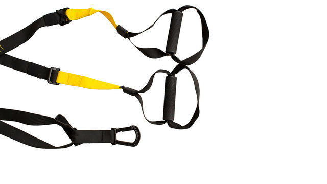 Black trx loop functional training equipment on white background isolated. Sport accessories, top view. Fitness and Gym workout items for Healthy.