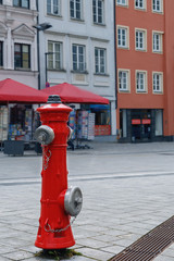powerful modern hydrant to extinguish a fire on the street of the German town of Landsberg am Lech