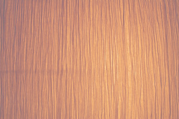 Yellow backlit grungy folded wrinkled paper texture