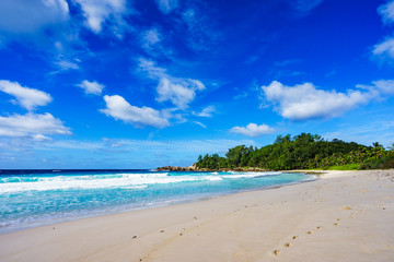 Fototapeta na wymiar Beautiful tropical beach,palms,white sand,granite rocks,seychelles 3