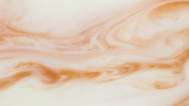 Colorful paint with silver particles organically moves in the liquid