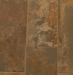 it is brown ceramic tile texture for pattern and background