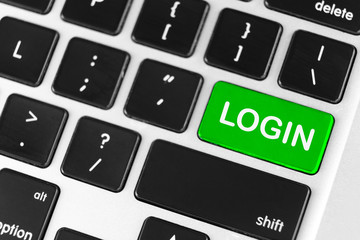 Login green button on the keyboard close-up