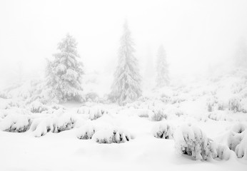 Winter alpine landscape in National Park Retezat, Carpathians, Romania, Europe. Snow covered moutains scenery