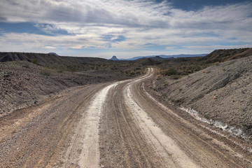 Fototapeta na wymiar Dirt road in the Texas Desert near the border with Mexico