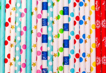 colorful cocktail straws for drinks. background